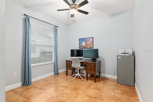 office space with ceiling fan and light tile patterned floors