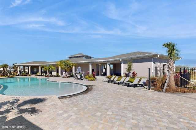 view of swimming pool with a patio