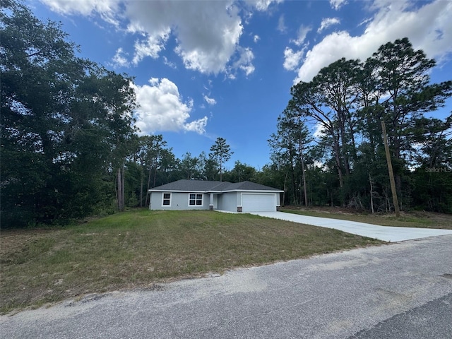 10964 N Frantz Ave, Citrus Springs, FL 34434 - single story home with a garage, concrete driveway, and a front yard