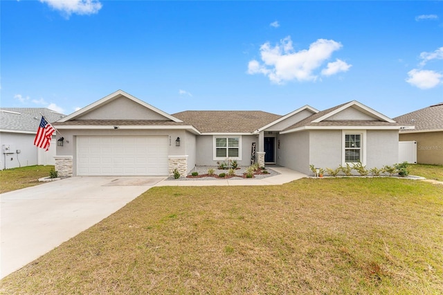 ranch-style house featuring a front yard and a garage