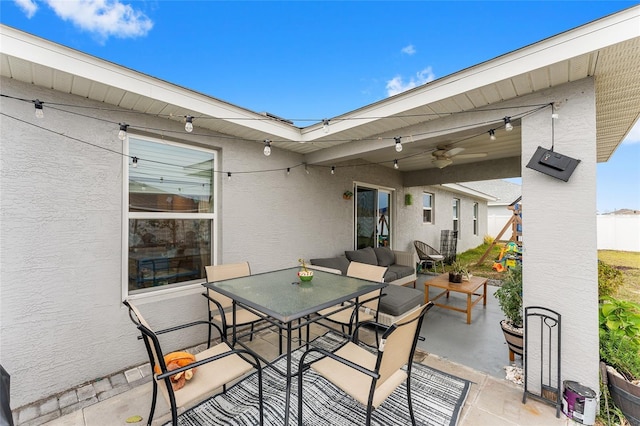 view of patio with ceiling fan