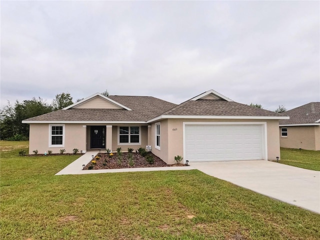 ranch-style home featuring a garage and a front lawn