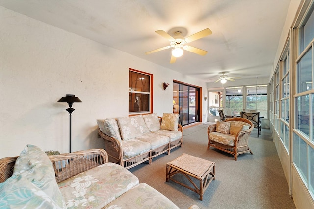 living room featuring ceiling fan