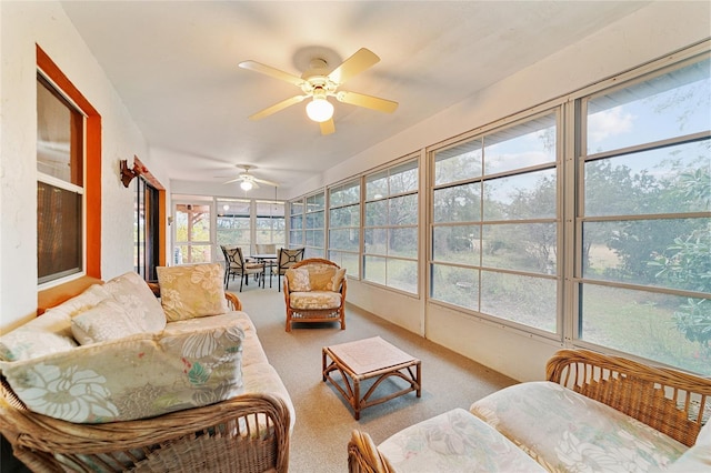 sunroom / solarium with ceiling fan