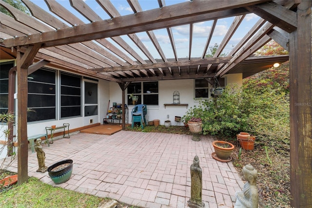 view of patio featuring a pergola