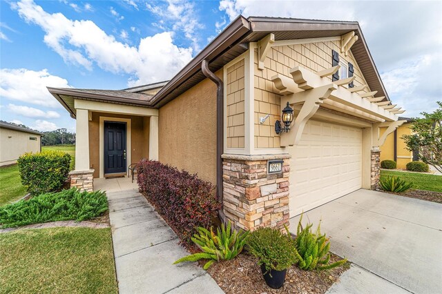 view of front of home with a garage