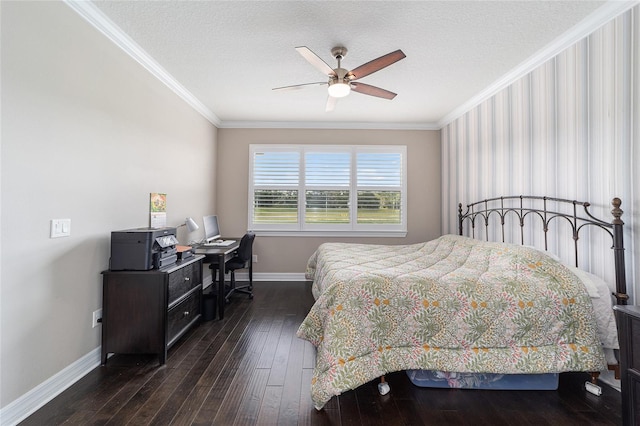 bedroom with ceiling fan, ornamental molding, dark hardwood / wood-style floors, and a textured ceiling