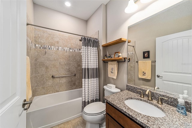 full bathroom with shower / bath combo, vanity, and toilet