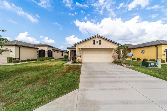 view of front of property featuring a garage and a front yard