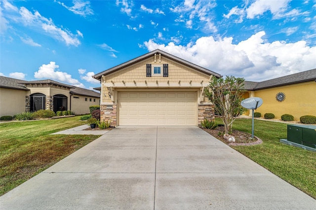 view of front of house featuring a garage and a front lawn