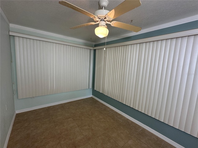 empty room featuring a textured ceiling