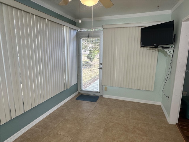 doorway with tile patterned floors and ceiling fan