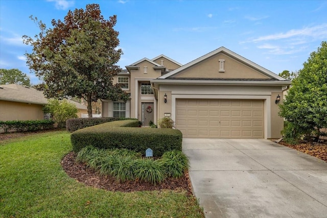 view of front of house featuring a garage and a front lawn