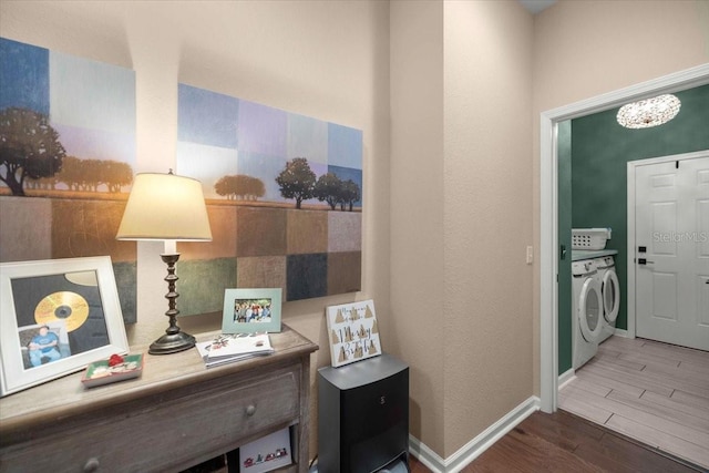 entrance foyer featuring washer and clothes dryer