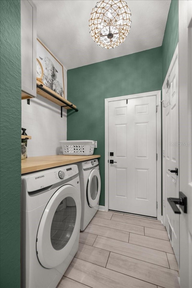 laundry area with washer and clothes dryer