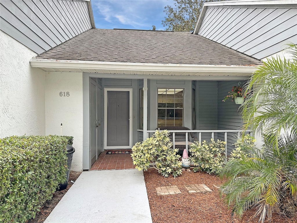 entrance to property with a porch