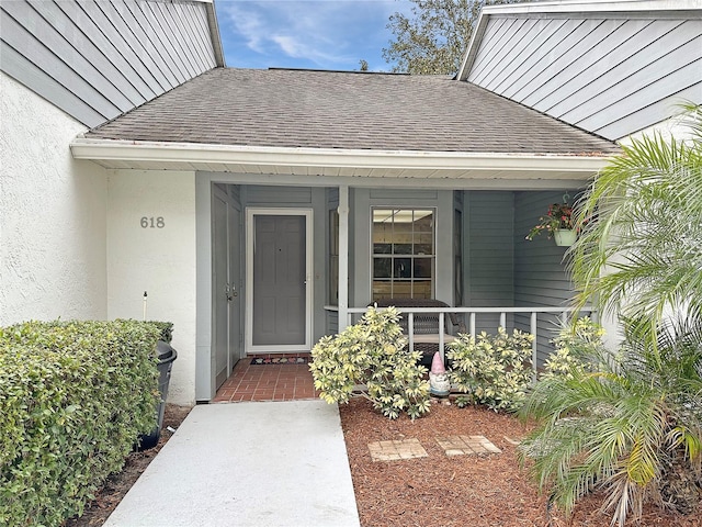 entrance to property with a porch