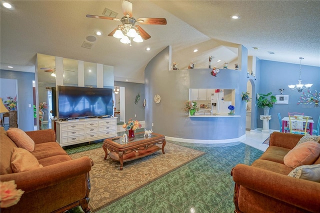 living room featuring ceiling fan with notable chandelier, a textured ceiling, and high vaulted ceiling