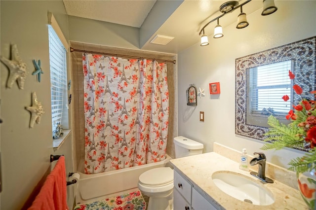 full bathroom with toilet, shower / bath combination with curtain, and vanity