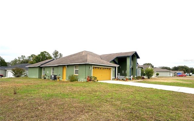 ranch-style house with central AC unit, an attached garage, driveway, stucco siding, and a front yard