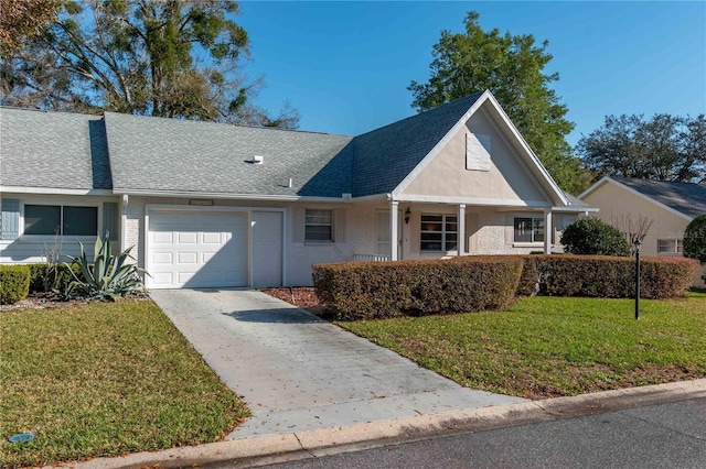 view of front of property featuring brick siding, a shingled roof, a garage, driveway, and a front lawn