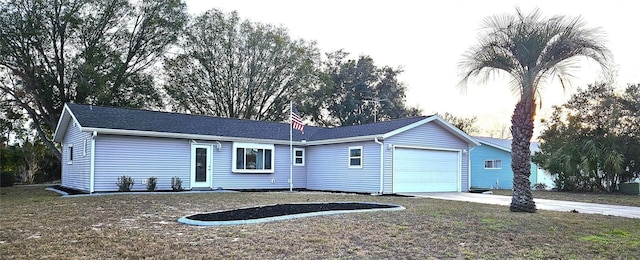 ranch-style home featuring a garage