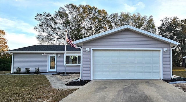 single story home featuring a garage