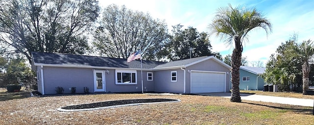 ranch-style house featuring a garage