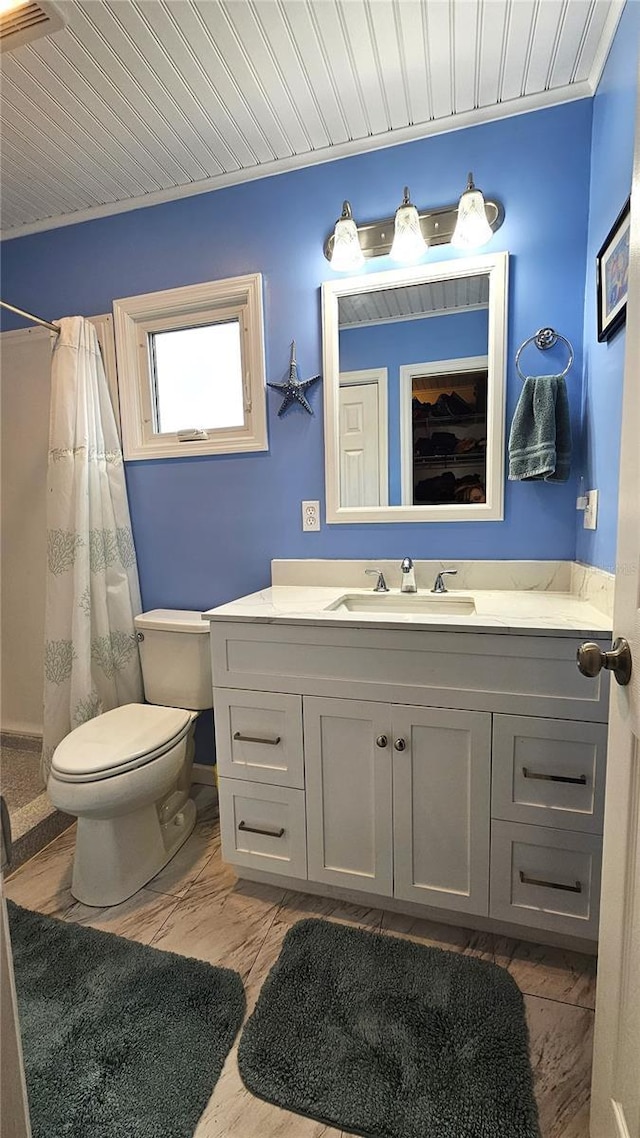 bathroom with vanity, wood ceiling, curtained shower, and toilet