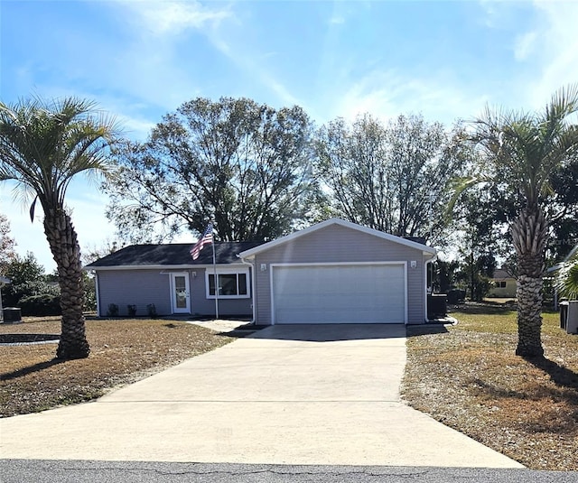 single story home featuring a garage