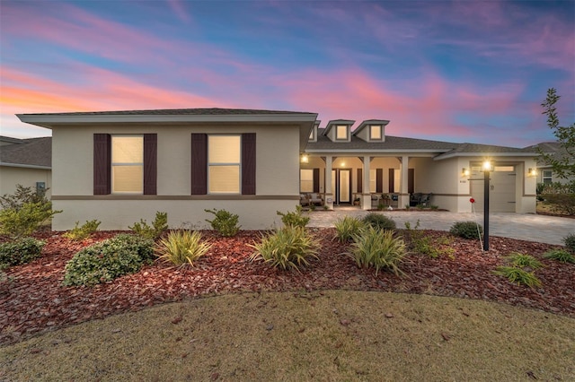 view of front of property with a garage