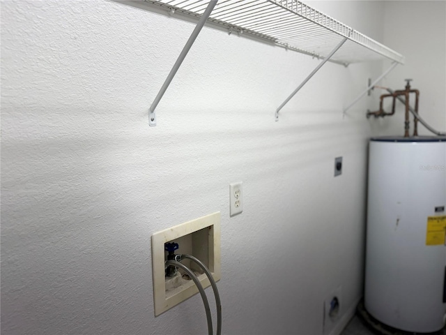 washroom featuring washer hookup, water heater, and electric dryer hookup