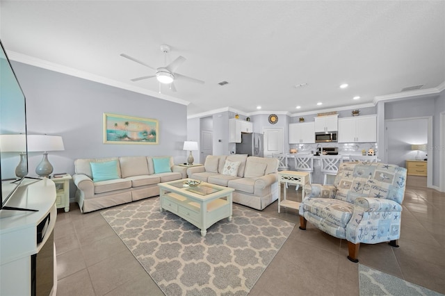 tiled living room featuring ceiling fan and ornamental molding