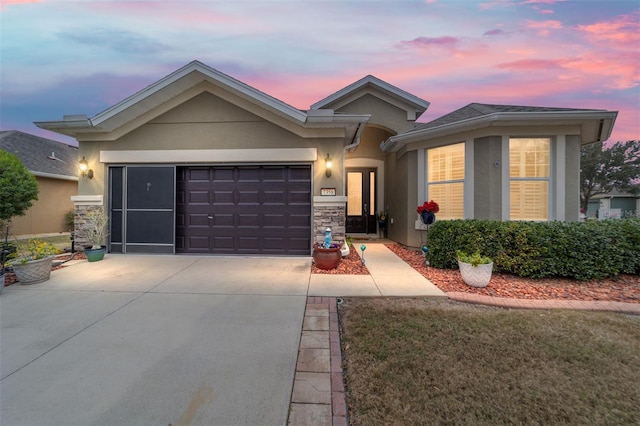 view of front of property with a garage