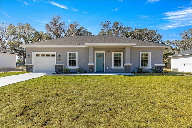 view of front of house with a garage and a front yard