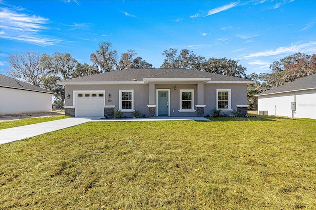 single story home with a garage and a front yard