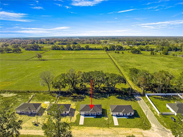 birds eye view of property featuring a rural view