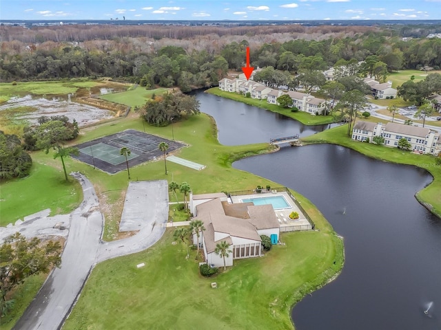 birds eye view of property featuring a water view