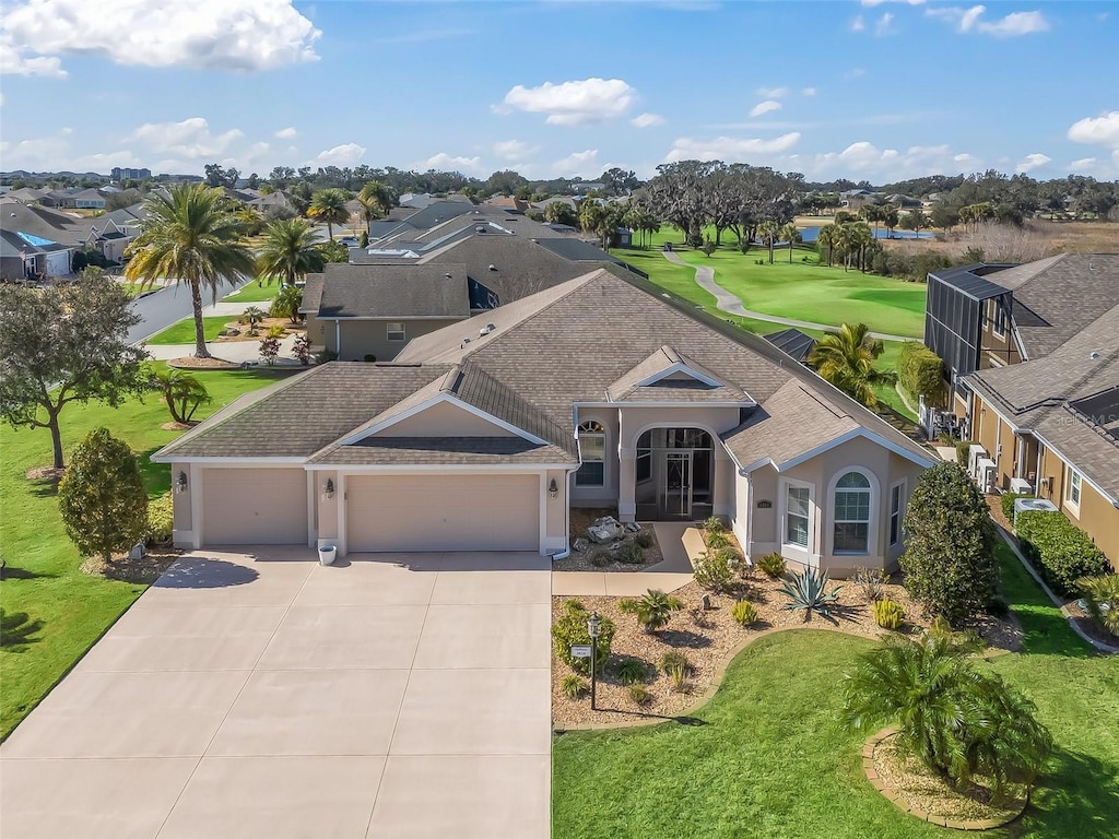 3416 Eisenhower Way, The Villages, FL 32163 - view of front of house with a garage