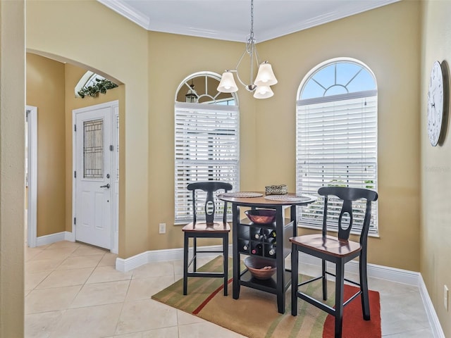 tiled dining space with ornamental molding and a notable chandelier