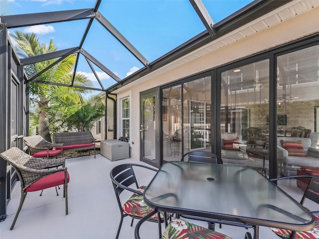 view of patio / terrace with a lanai