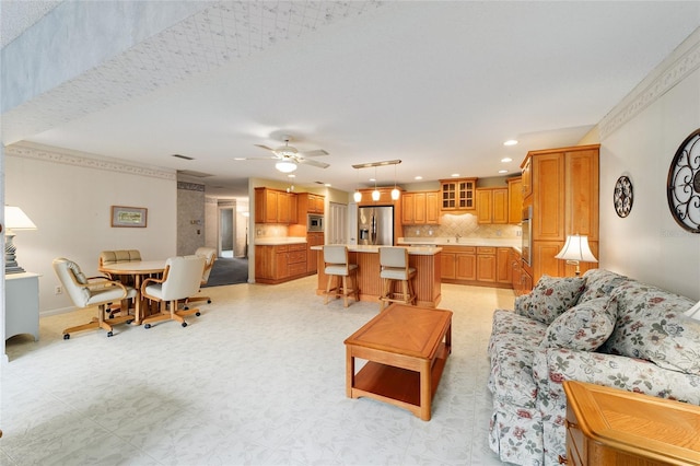 living room with ceiling fan