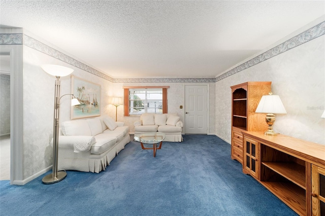 living room featuring dark colored carpet and a textured ceiling