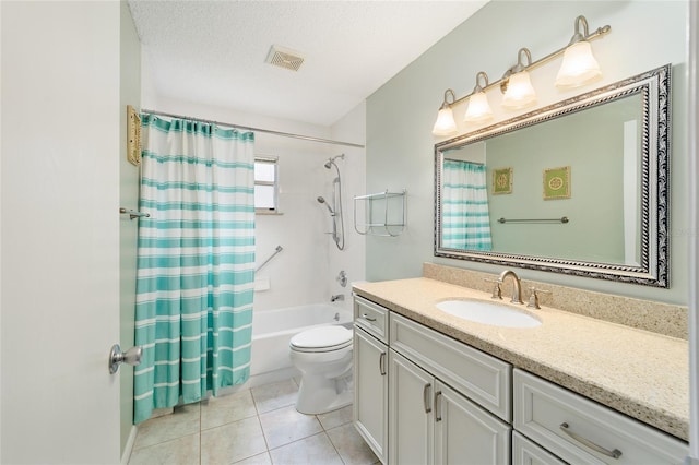 full bathroom with toilet, a textured ceiling, tile patterned flooring, shower / bath combo, and vanity