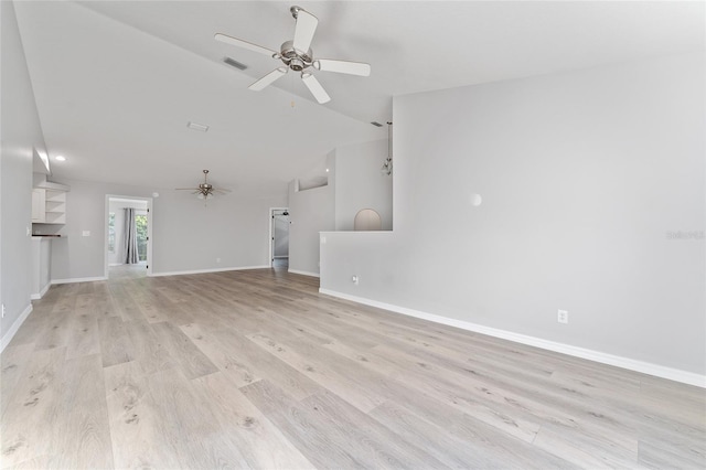 unfurnished living room featuring light hardwood / wood-style floors, ceiling fan, and vaulted ceiling