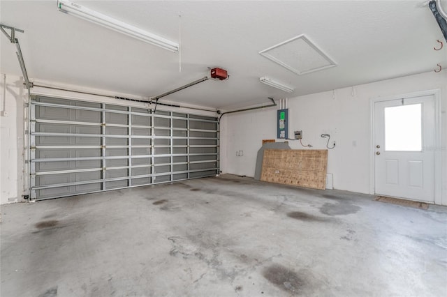 garage featuring a garage door opener