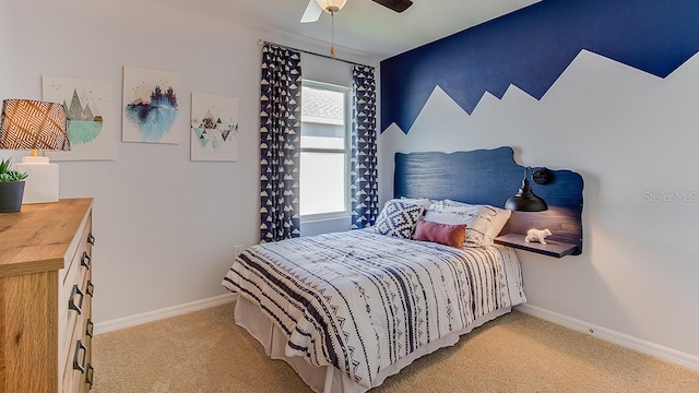 bedroom featuring ceiling fan, multiple windows, and light carpet