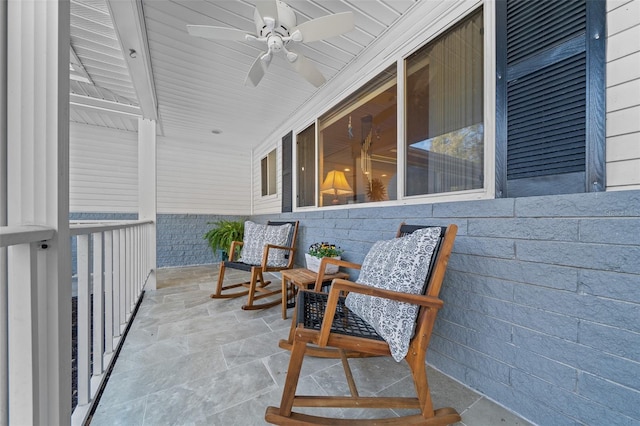 exterior space featuring ceiling fan