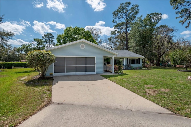 ranch-style house featuring a garage, a front lawn, and concrete driveway