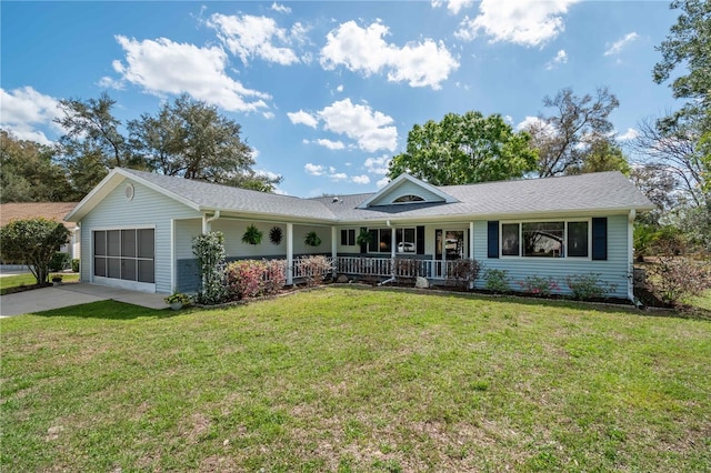 ranch-style house with a front lawn, covered porch, an attached garage, and concrete driveway